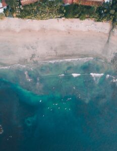 Ariel View of Tamarindo, ocean water with beach