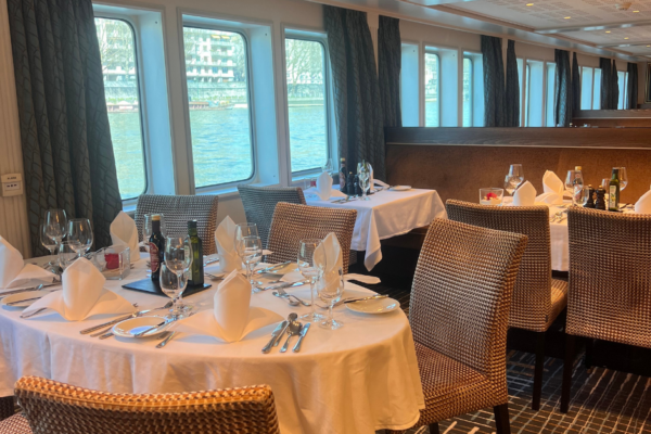 Elegant dining room aboard an AmaWaterways ship, a luxury river cruise option recommended by a river cruise travel consultant.