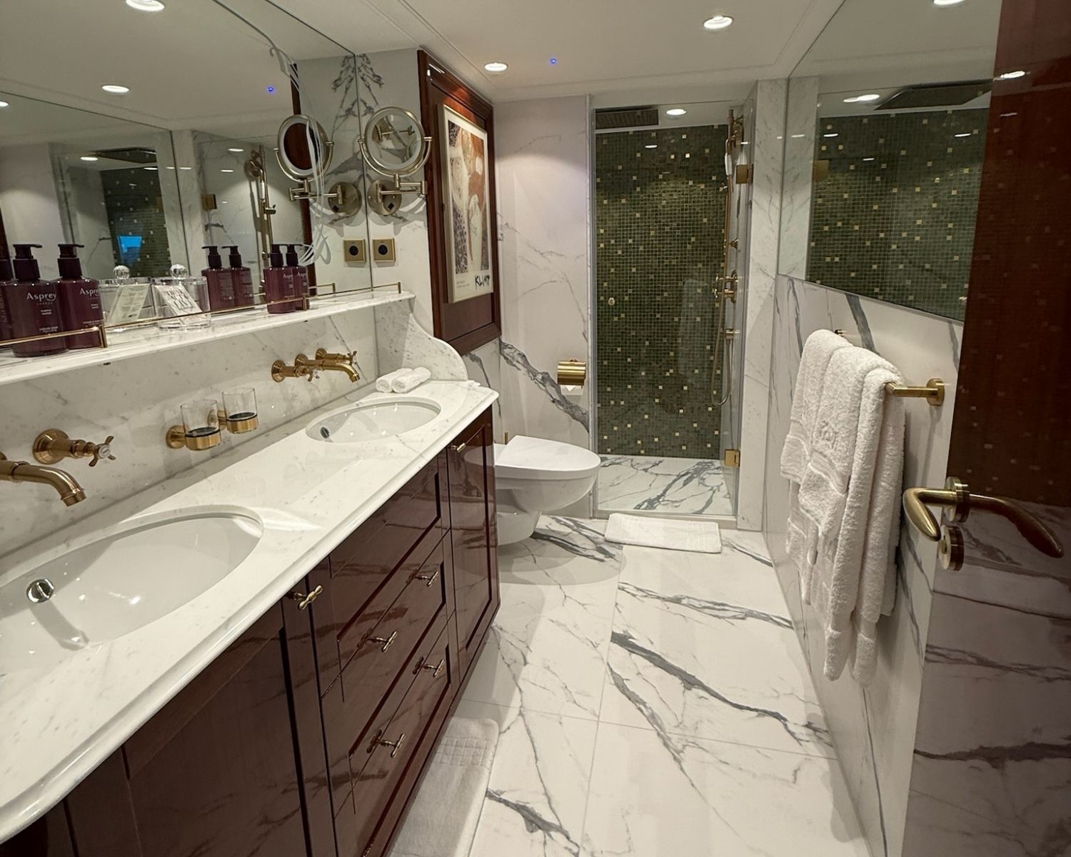 Elegant bathroom on a Uniworld ship showcasing the elevated design and amenities found on luxury river cruises and all inclusive river cruise experiences.